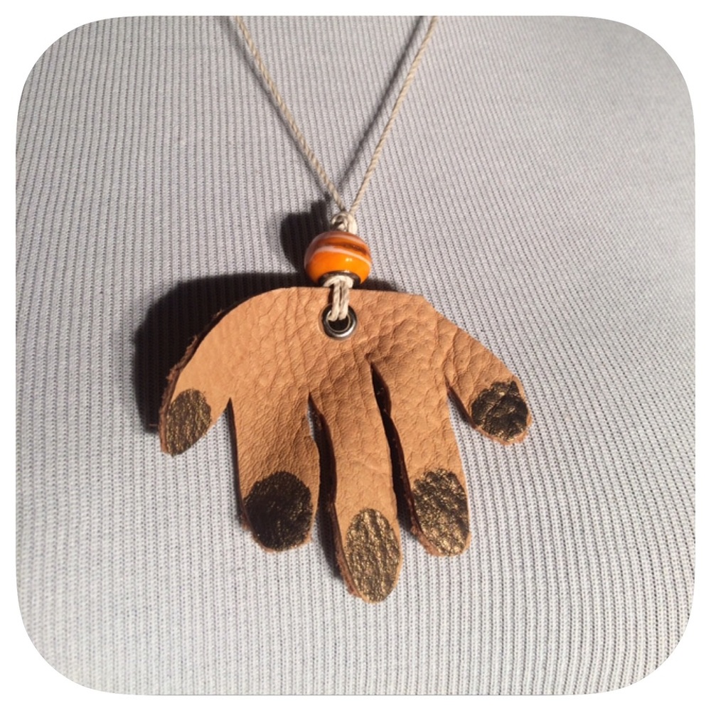 Whimsical leather hand necklace